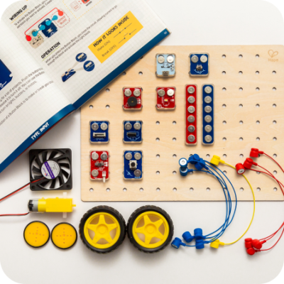 We invent <span class="purple">high-quality</span> educational products that give the power of <span class="red">creation</span> to children ages <span class="blue">8+</span>, while <span class="yellow">challenging</span> them to problem solve for real!